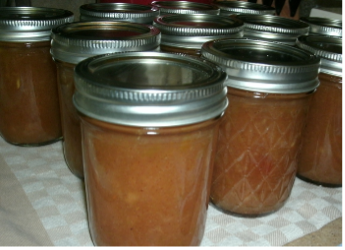 The finished fruit butter in mason jars
