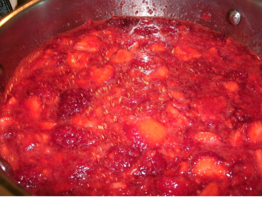 Strawberry Rhubarb Jam being made in a pot