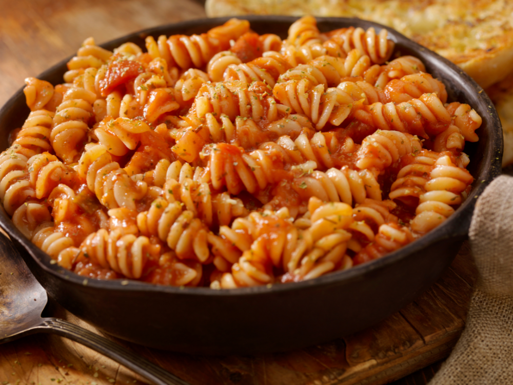 cooked rotini pasta, coated in a rich homemade pasta sauce